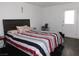 Bedroom with a queen-sized bed and neutral decor at 2921 Country Manor Ln # 139, Las Vegas, NV 89115