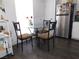 Eat-in kitchen featuring a glass-topped dining table with stainless steel appliances at 2921 Country Manor Ln # 139, Las Vegas, NV 89115