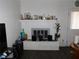 Living room featuring a white brick fireplace and mantel at 2921 Country Manor Ln # 139, Las Vegas, NV 89115