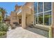 Beautiful backyard featuring a covered patio, tiled flooring, and large windows offering natural light at 3111 Lido Isle Ct, Las Vegas, NV 89117