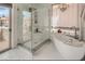 Beautiful bathroom features a freestanding tub and separate glass enclosed shower at 3111 Lido Isle Ct, Las Vegas, NV 89117