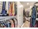 Spacious walk-in closet with custom shelving, cabinets, and ample storage space at 3111 Lido Isle Ct, Las Vegas, NV 89117