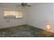 Bedroom with neutral walls and a window with blinds at 3175 Palmdale St, Las Vegas, NV 89121