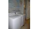 Laundry room with washing machine and dryer on linoleum flooring at 3175 Palmdale St, Las Vegas, NV 89121