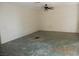 Empty living room with neutral walls and a ceiling fan at 3175 Palmdale St, Las Vegas, NV 89121
