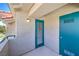 This is a view of the open air, covered balcony with the apartment doors at 370 Manti Pl # 21, Henderson, NV 89014