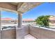 This balcony offers a view of the community and a blue sky at 370 Manti Pl # 21, Henderson, NV 89014