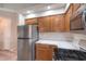 Well-equipped kitchen boasts stainless steel appliances and ample cabinet space at 370 Manti Pl # 21, Henderson, NV 89014