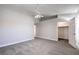 Open and airy main bedroom with neutral color palette and plush carpet flooring at 370 Manti Pl # 21, Henderson, NV 89014