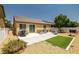 Large backyard with ample patio space, green turf, and privacy, ideal for outdoor activities at 3773 Blake Canyon Dr, North Las Vegas, NV 89032