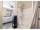 Bathroom with shower and tub combo plus view of bedroom at 3773 Blake Canyon Dr, North Las Vegas, NV 89032