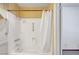 A bathroom features a shower and tub combo with support bars at 4036 Nightingale Ct, Las Vegas, NV 89107