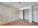 Bedroom includes a closet and patterned wallpaper at 4036 Nightingale Ct, Las Vegas, NV 89107