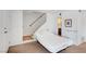 Bedroom with a bed, a staircase, and an entrance to the bathroom at 4036 Nightingale Ct, Las Vegas, NV 89107