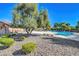 Enjoy this sparkling community pool surrounded by desert landscaping and mature trees for relaxing shade at 4036 Nightingale Ct, Las Vegas, NV 89107
