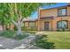 Inviting home with a well-maintained front yard, mature trees, and a cozy entrance at 4036 Nightingale Ct, Las Vegas, NV 89107