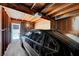 Attached garage featuring wood ceiling and natural light at 4036 Nightingale Ct, Las Vegas, NV 89107