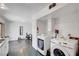 Open laundry area with Samsung washer and dryer, leads to office with outdoor access at 4036 Nightingale Ct, Las Vegas, NV 89107