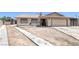 Charming single-story home featuring desert landscaping, attached garage, and welcoming front entrance at 4458 El Quinta Ct, Las Vegas, NV 89121