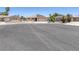 Street view of desert homes with mature palms at 4458 El Quinta Ct, Las Vegas, NV 89121