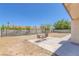 The home has a spacious backyard with a concrete patio and block wall fencing at 4784 El Escorial Dr, Las Vegas, NV 89121
