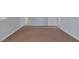 Neutral bedroom with beige carpet and white trim at 4784 El Escorial Dr, Las Vegas, NV 89121