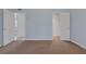 Neutral bedroom with beige carpet and white trim at 4784 El Escorial Dr, Las Vegas, NV 89121