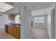 Bright living area that flows into an open concept kitchen, with updated tile floors at 4784 El Escorial Dr, Las Vegas, NV 89121