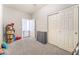 Cozy bedroom offers ample space, closet and neutral color palette at 5009 Peaceful Pond Ave, Las Vegas, NV 89131