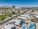 Aerial view of the neighborhood, showcasing rooftops, roads, and distant mountains at 5093 Sun Valley Dr, Las Vegas, NV 89122