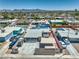 Aerial view of homes featuring solar panels, carport, and front yard landscaping at 5093 Sun Valley Dr, Las Vegas, NV 89122