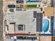 Aerial view of property showcasing the pool, solar panels, backyard, and surrounding neighborhood at 5093 Sun Valley Dr, Las Vegas, NV 89122