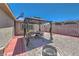 Cozy backyard gazebo with dining set, perfect for outdoor entertaining and relaxation at 5093 Sun Valley Dr, Las Vegas, NV 89122
