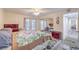Bright bedroom featuring mirrored closet doors and an exterior entrance at 5093 Sun Valley Dr, Las Vegas, NV 89122