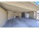 Spacious carport featuring concrete flooring, overhead lighting, and access to storage at 5093 Sun Valley Dr, Las Vegas, NV 89122