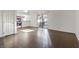 Bright, open-concept living space with hardwood floors and sliding door access to a patio at 5200 Indian River Dr # 301, Las Vegas, NV 89103