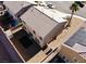 Aerial view of home's backyard featuring minimal landscaping, block wall and room for outdoor living at 5308 Hollyridge St, North Las Vegas, NV 89081