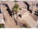 Two-story home featuring a desert-landscaped front yard, tile roof and a two-car garage at 5308 Hollyridge St, North Las Vegas, NV 89081