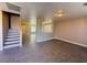Bright, open living space showcasing tile floors and a view into the adjacent rooms at 5308 Hollyridge St, North Las Vegas, NV 89081