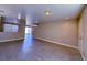 Open living space with tile floors, neutral walls, and an entryway to other rooms at 5308 Hollyridge St, North Las Vegas, NV 89081