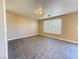 Living area with tile floors, neutral walls, and windows letting in ample sunlight at 5308 Hollyridge St, North Las Vegas, NV 89081