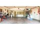 Spacious garage featuring ample storage with built-in cabinets and overhead shelving at 5929 Gentle Creek Ln, North Las Vegas, NV 89031