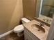 Bathroom featuring a toilet and sink with granite countertops at 608 Watkins Dr, Las Vegas, NV 89107