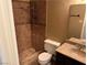 Bathroom featuring tiled shower with glass door and a granite vanity at 608 Watkins Dr, Las Vegas, NV 89107