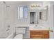 Bright bathroom featuring a tub and shower, and single sink vanity at 641 Bay Bridge Dr, North Las Vegas, NV 89032