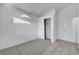 Bedroom features neutral carpet, closet with sliding doors, and natural light at 641 Bay Bridge Dr, North Las Vegas, NV 89032