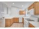 Bright kitchen features white appliances, tile flooring, and plenty of counter space for cooking at 641 Bay Bridge Dr, North Las Vegas, NV 89032