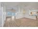 Bright living room featuring laminate flooring, natural light, and a seamless open concept design at 641 Bay Bridge Dr, North Las Vegas, NV 89032