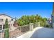 Outdoor balcony offering a scenic neighborhood view on a bright, sunny day at 7537 Splashing Rock Dr, Las Vegas, NV 89131