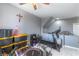 A bedroom with exercise equipment, including a treadmill and trampoline at 7537 Splashing Rock Dr, Las Vegas, NV 89131